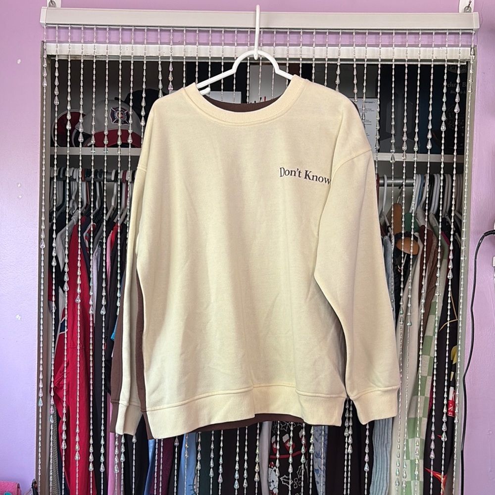 Cream Sweatshirt with Text